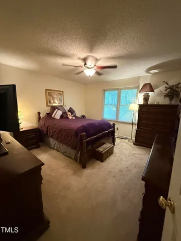 a view of washer and dryer with wooden floor