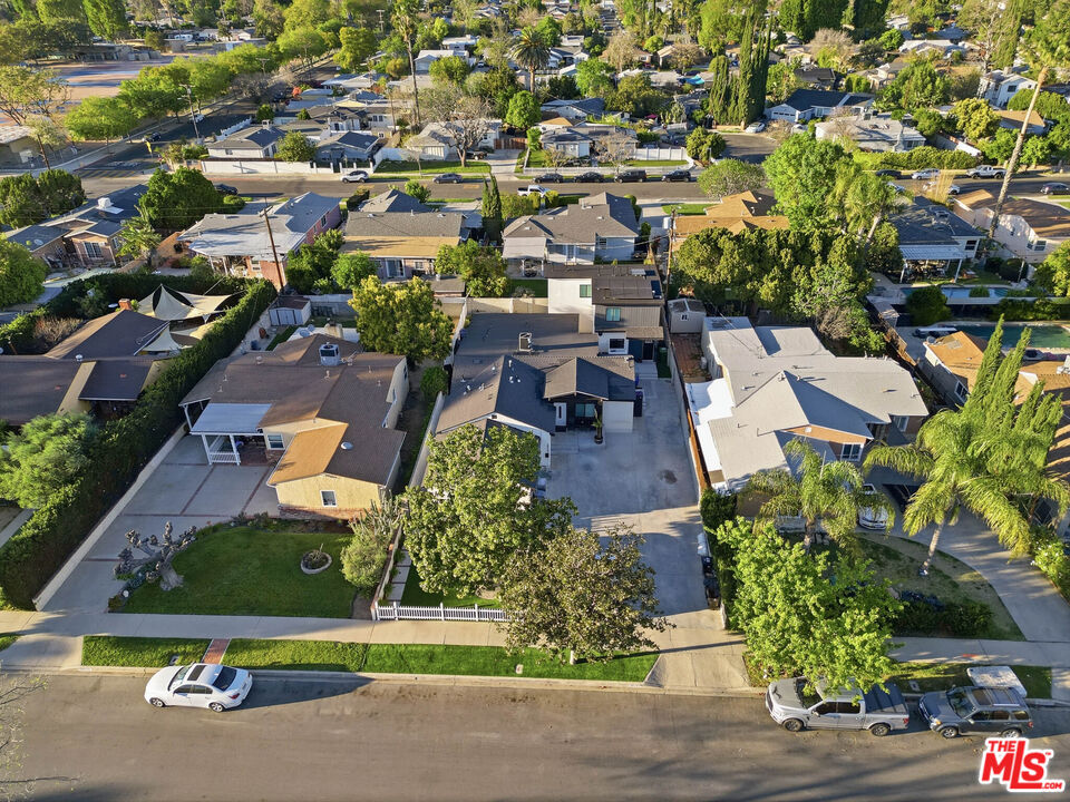 20237 Hartland Street Winnetka, CA 91306 - Photo 13 of 13 an aerial view of a house with yard basket ball court and outdoor seating