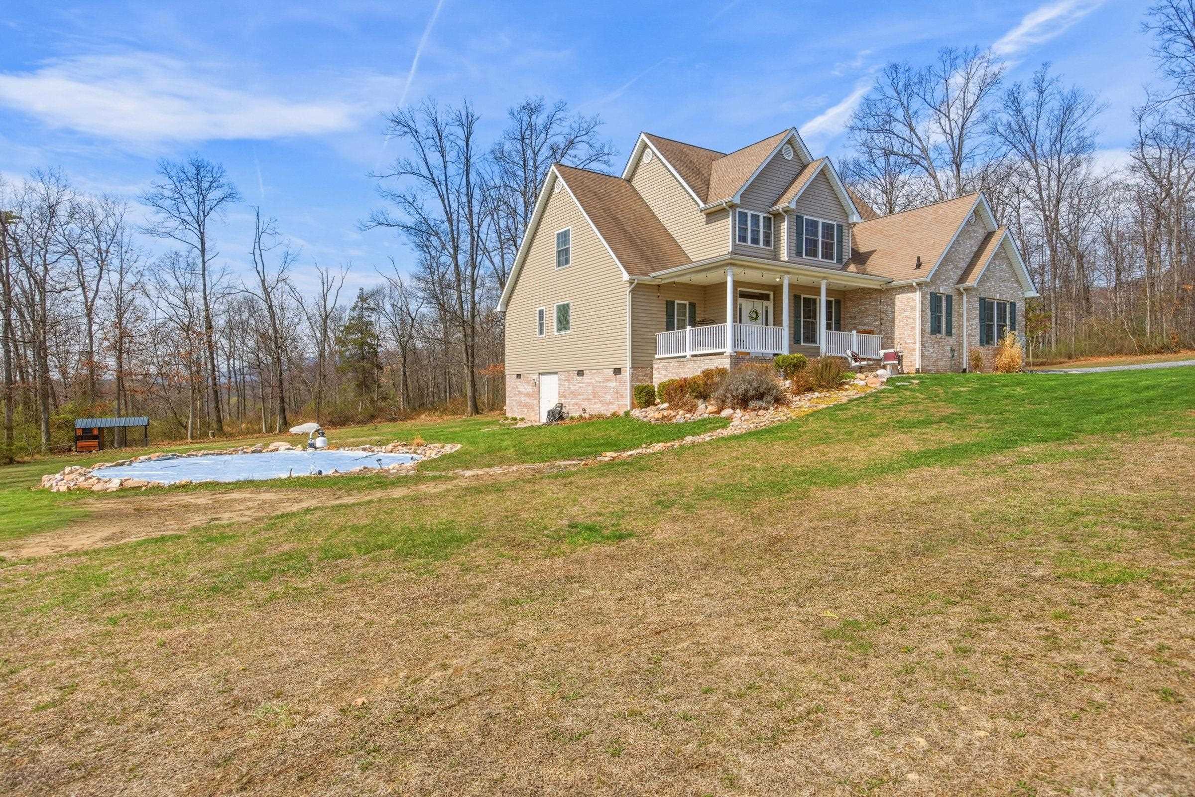 257 Hunter Road Maurertown, VA 22644 - Photo 36 of 61 a front view of a house with a yard