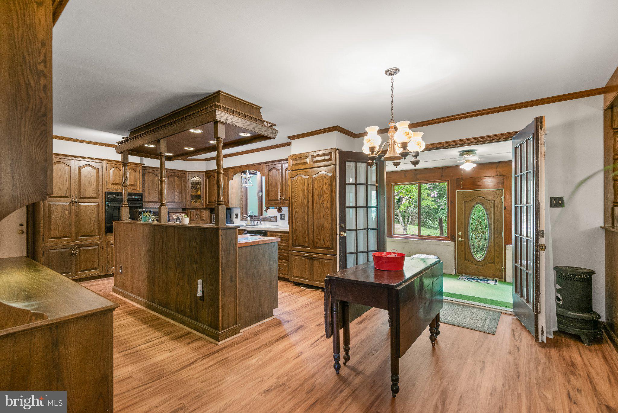 500 Reeds Road Downingtown, PA 19335 - Photo 11 of 37 Eat in kitchen with view to 3-season room