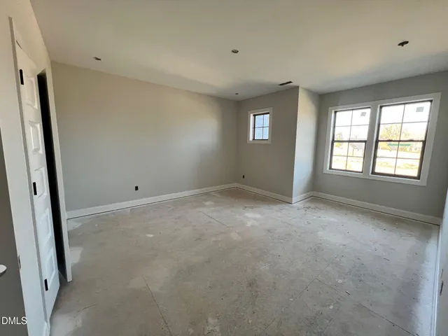 a kitchen with a sink stove and refrigerator