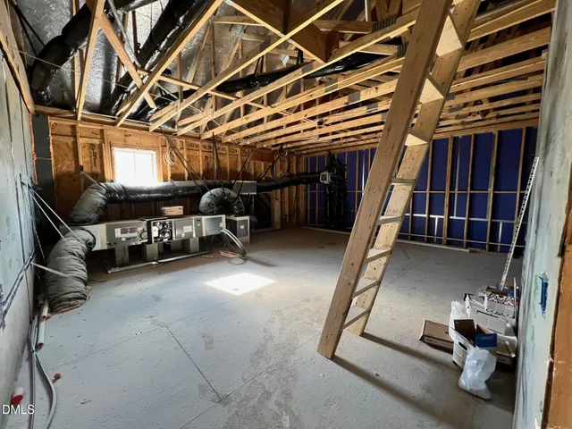 a kitchen with stove and cabinets