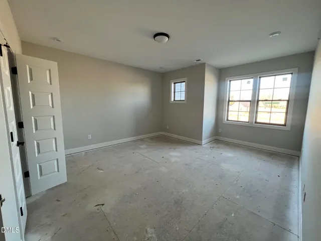 a kitchen with a sink stove and refrigerator