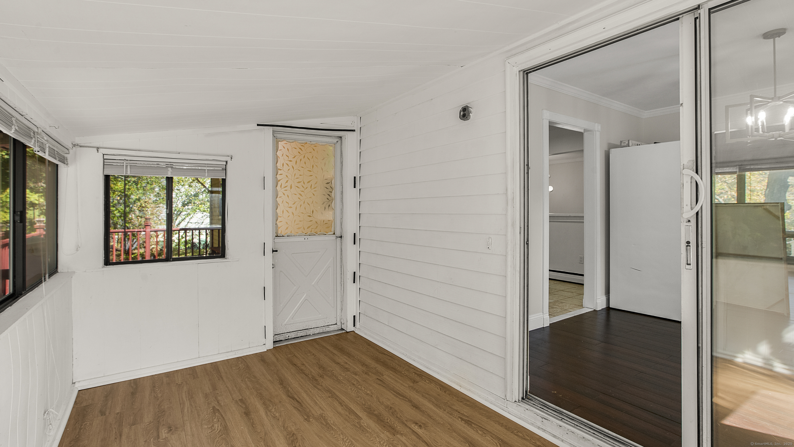 739 Field Street Naugatuck, CT 06770 - Photo 13 of 14 wooden floor in an empty room with a window