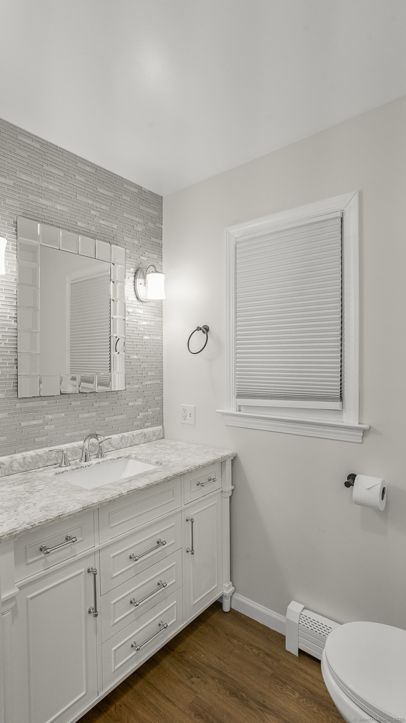 739 Field Street Naugatuck, CT 06770 - Photo 8 of 14 a bathroom with a granite countertop toilet sink and mirror