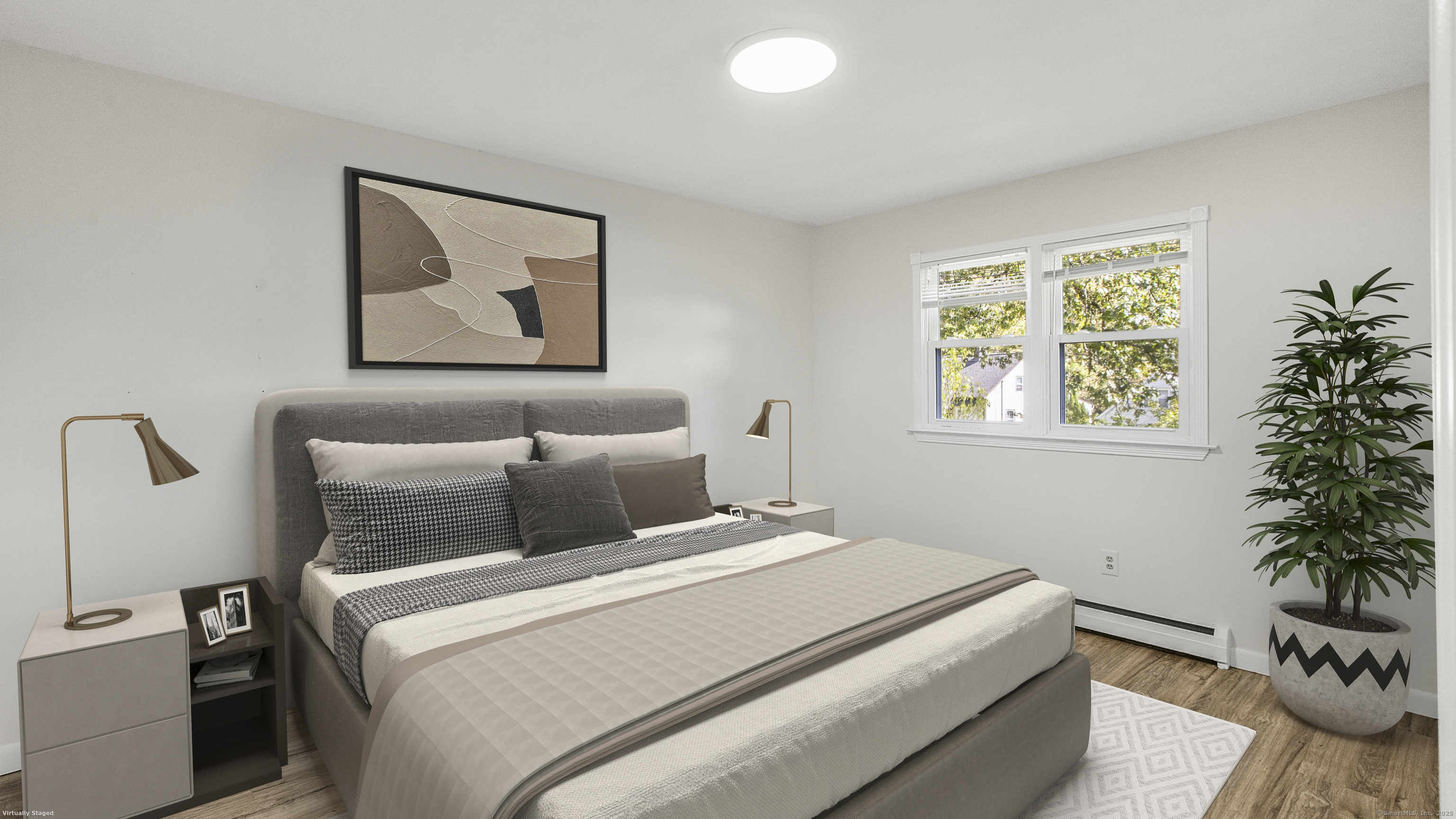 739 Field Street Naugatuck, CT 06770 - Photo 10 of 14 a bedroom with a bed and a potted plant