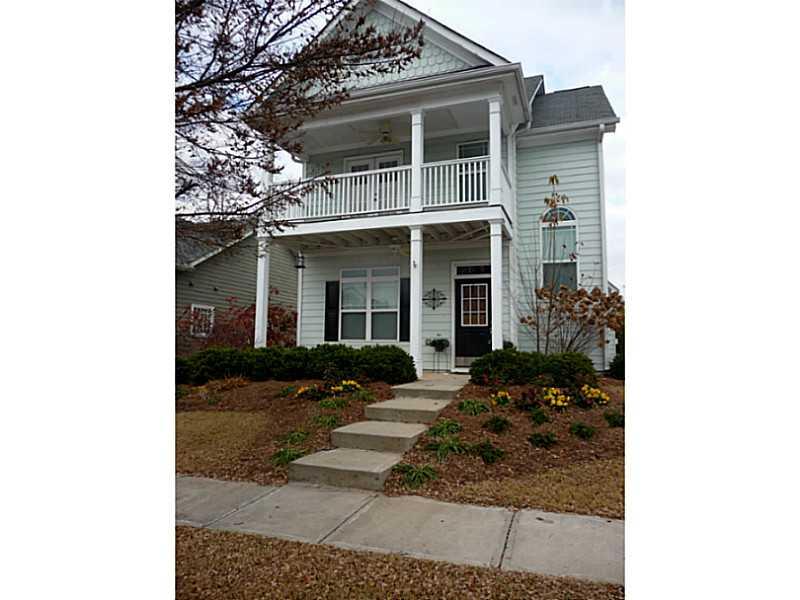 Exterior Front. Awesome 4 bedroom 2.5 Bath in Harmony Om The Lakes. WIth a rocking chair front porch.