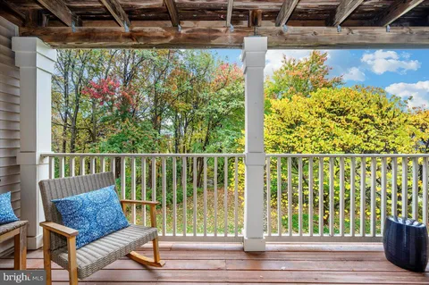 a view of a porch with a bench