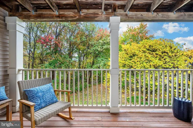 a view of a porch with a bench