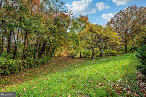 front view of a building with a yard
