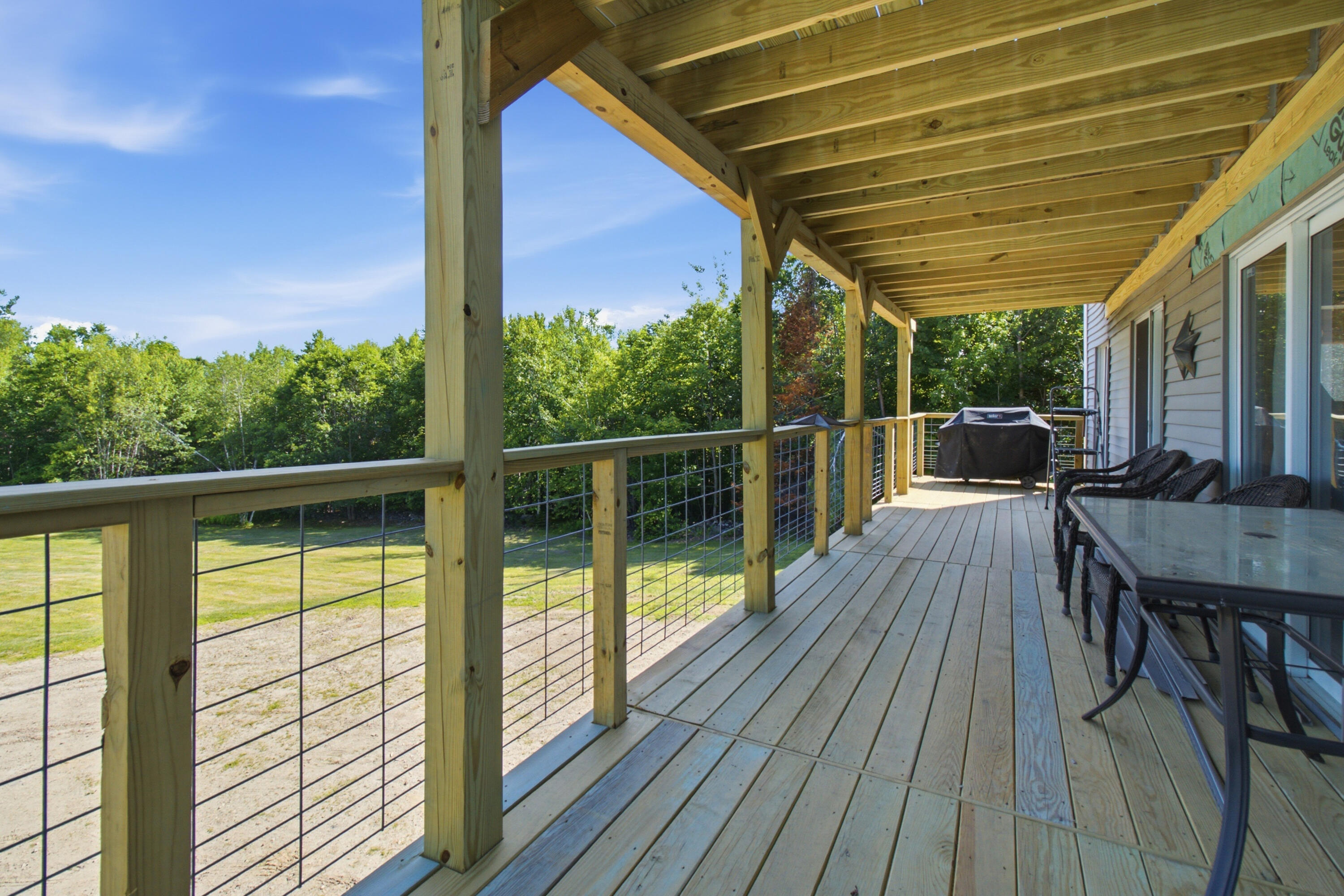 157 Durgin Road Paris, ME 04281 - Photo 24 of 32 New deck the length of the home