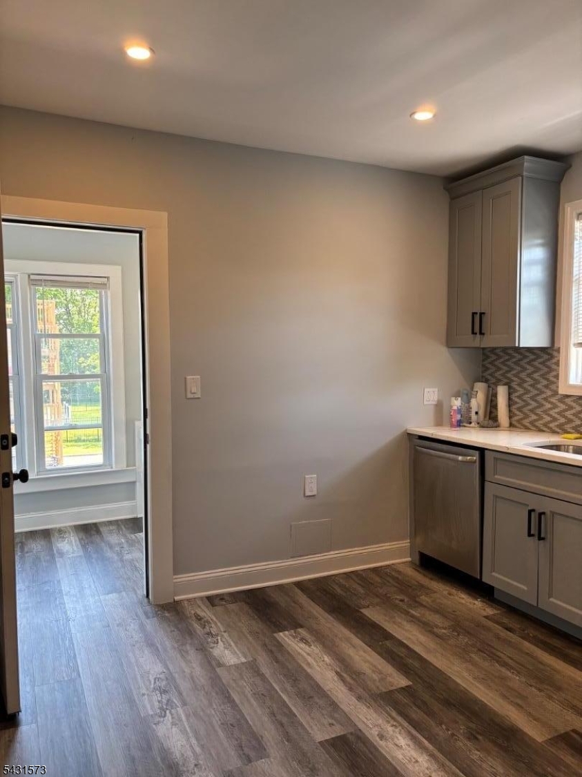 358 Woodland Road, Unit 2 Madison, NJ 07940 - Photo 11 of 50 a room with a sink wooden floor and window