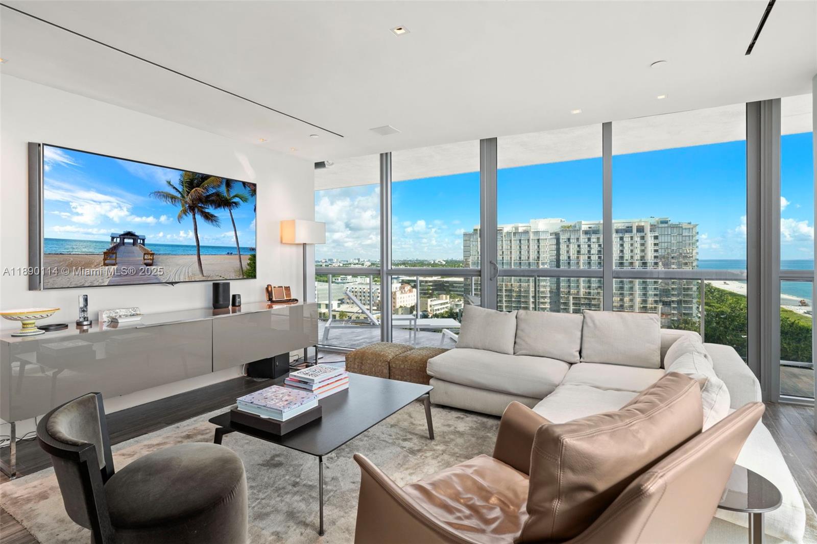 101 20th Street, Unit 2007 Miami Beach, FL 33139 - Photo 12 of 41 a living room with furniture and a floor to ceiling window