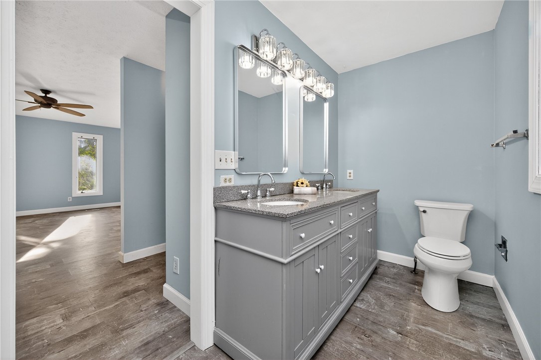 4747 Fawnwood Road Dayton, OH 45429 - Photo 29 of 58 This bathroom features a double vanity with granite counters, offering both style and practicality.