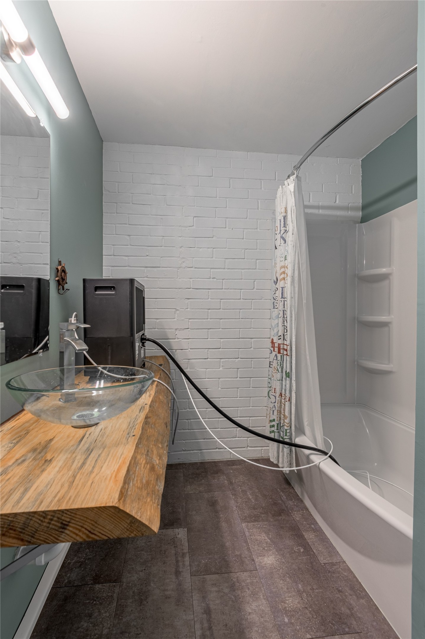 356 Peach Island Road Trinity, TX 75862 - Photo 21 of 34 a bedroom with a bed and a flat screen tv