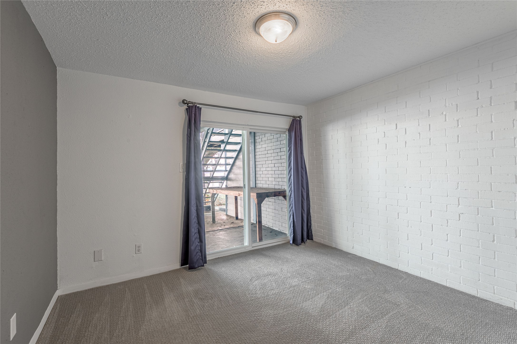 356 Peach Island Road Trinity, TX 75862 - Photo 23 of 34 an empty room with windows