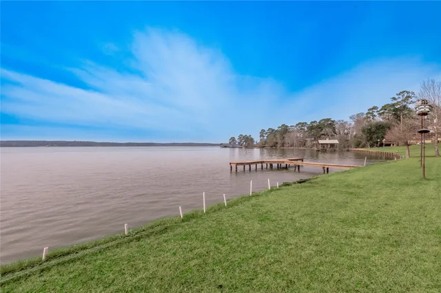 a view of a lake with a building in the background