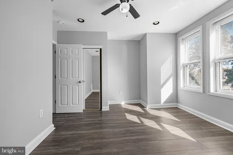 a view of entryway with wooden floor