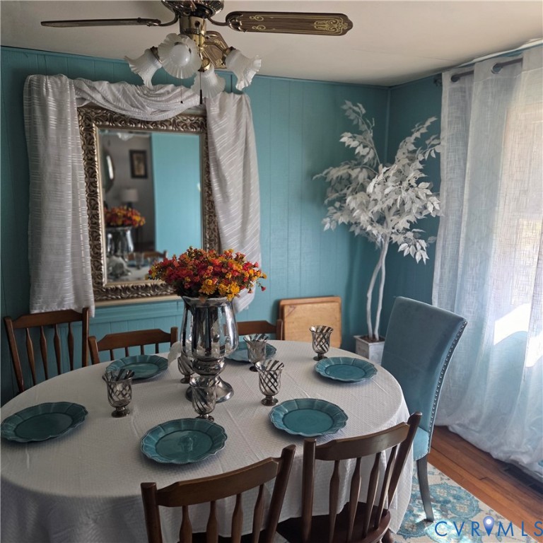 3065 Chickahominy Road Toano, VA 23168 - Photo 5 of 15 a view of a dining room with furniture and wooden floor