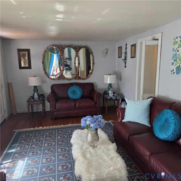 3065 Chickahominy Road Toano, VA 23168 - Photo 6 of 15 a living room with furniture and wooden floor