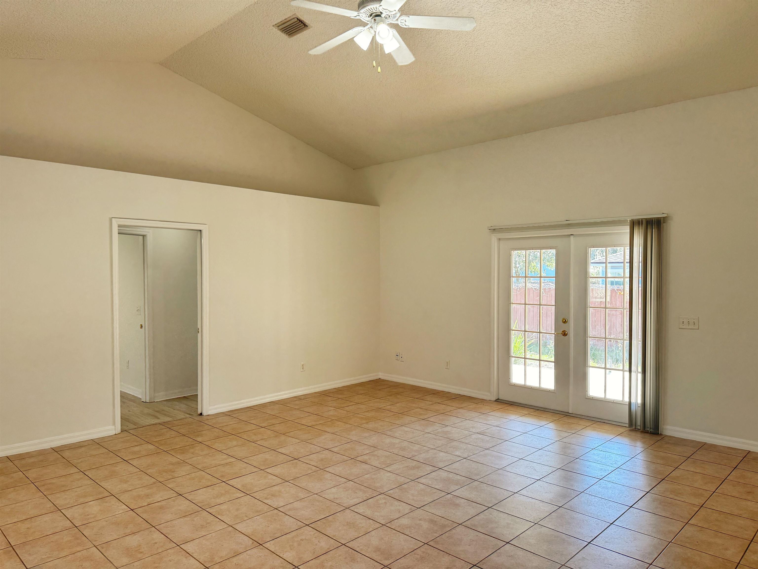 632 Segovia Road St. Augustine, FL 32086 - Photo 7 of 28 a view of an empty room with window