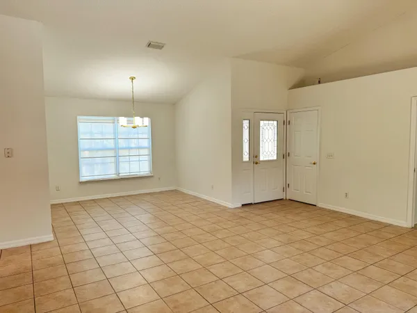 a view of a kitchen with a sink cabinets and a window