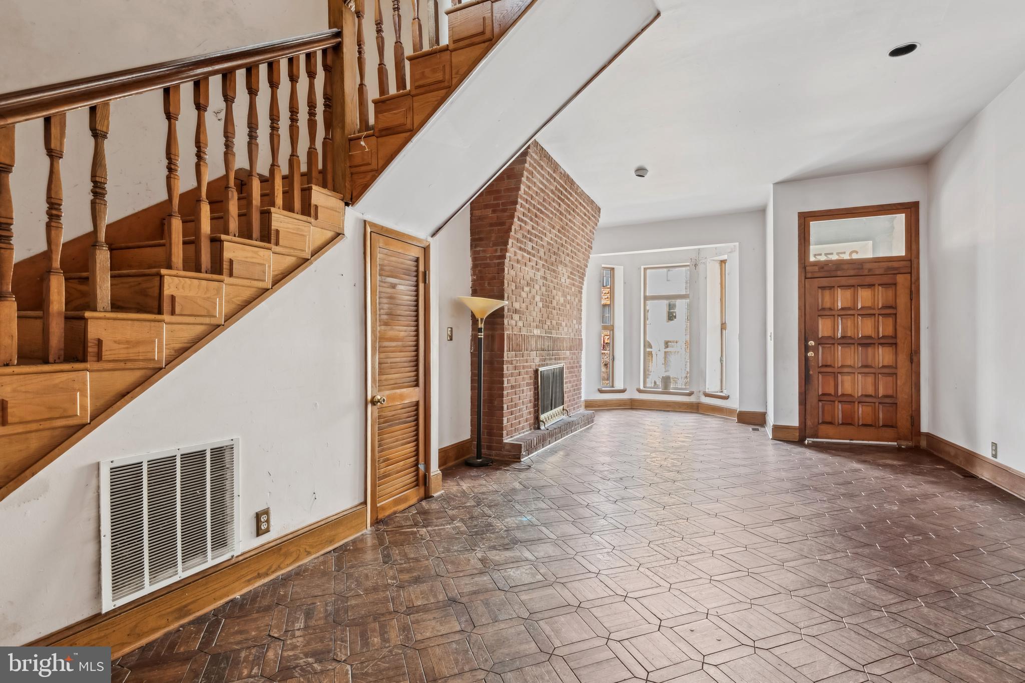 2333 Eutaw Place Baltimore, MD 21217 - Photo 8 of 37 a view of an entryway with wooden floor