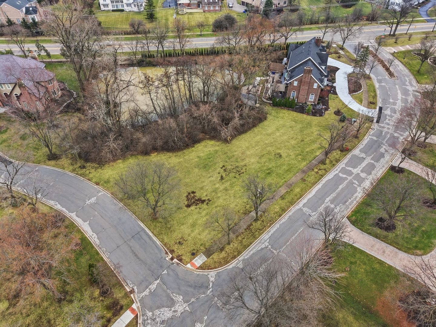9045 Turnberry Drive Burr Ridge, IL 60527 - Photo 9 of 14 a view of a swimming pool with a yard