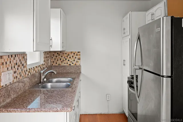 a backyard of a house with seating space