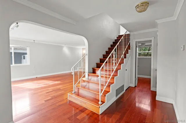a view of entryway with wooden floor