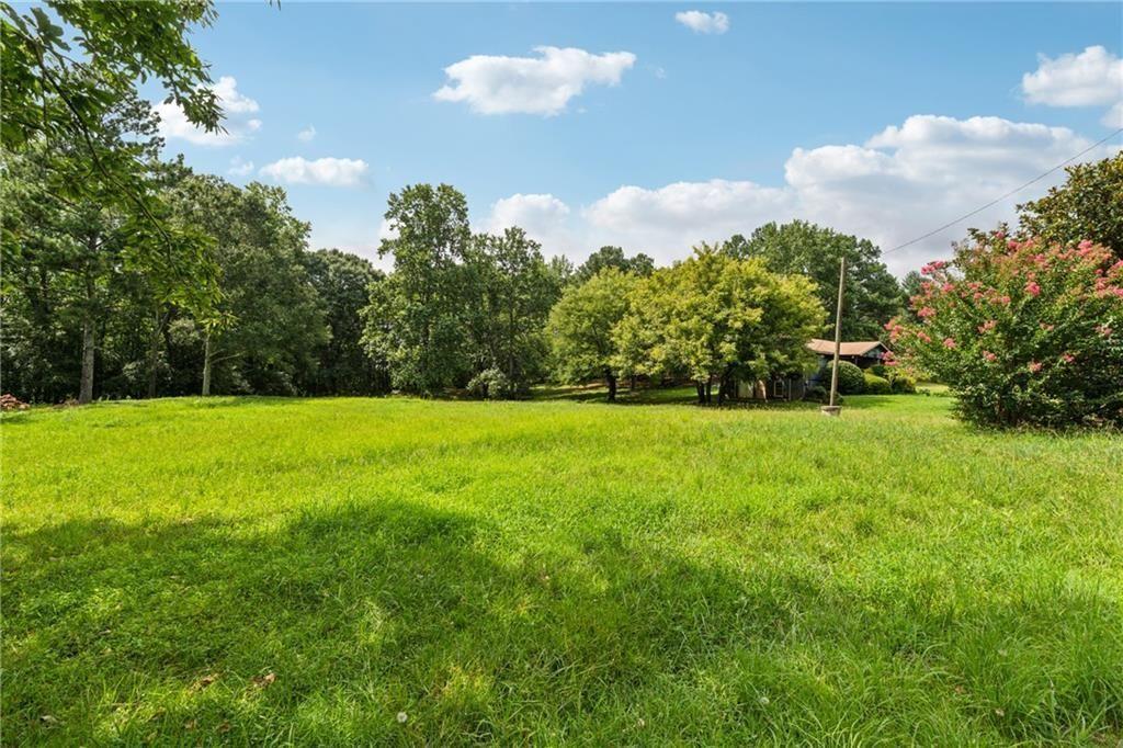 a view of a garden with a fountain