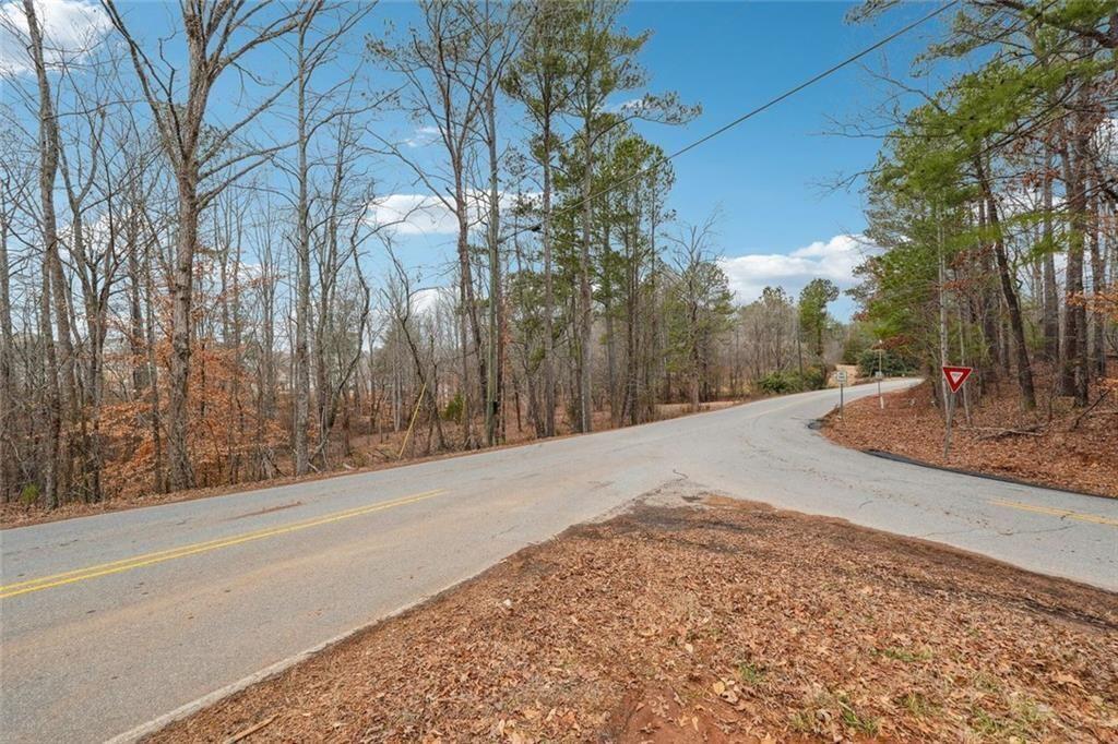 8265 Seabolt Drive Ball Ground, GA 30107 - Photo 31 of 52 a view of a backyard of the house