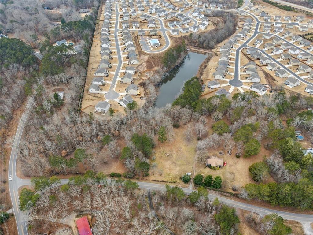 8265 Seabolt Drive Ball Ground, GA 30107 - Photo 44 of 52 a view of house with a yard