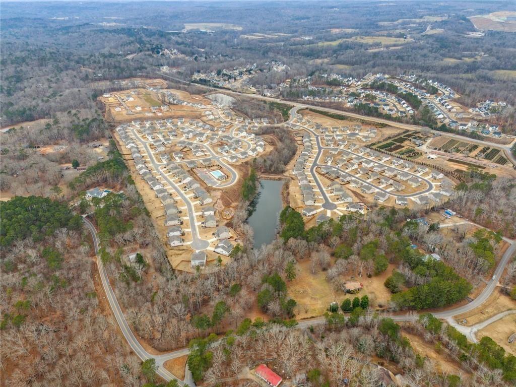 8265 Seabolt Drive Ball Ground, GA 30107 - Photo 51 of 52 a view of residential houses with yard