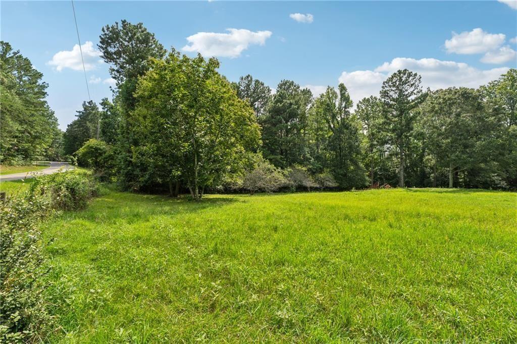 8265 Seabolt Drive Ball Ground, GA 30107 - Photo 7 of 52 a view of outdoor space with deck and yard