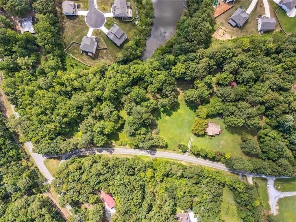 8265 Seabolt Drive Ball Ground, GA 30107 - Photo 8 of 52 an aerial view of a house with a yard