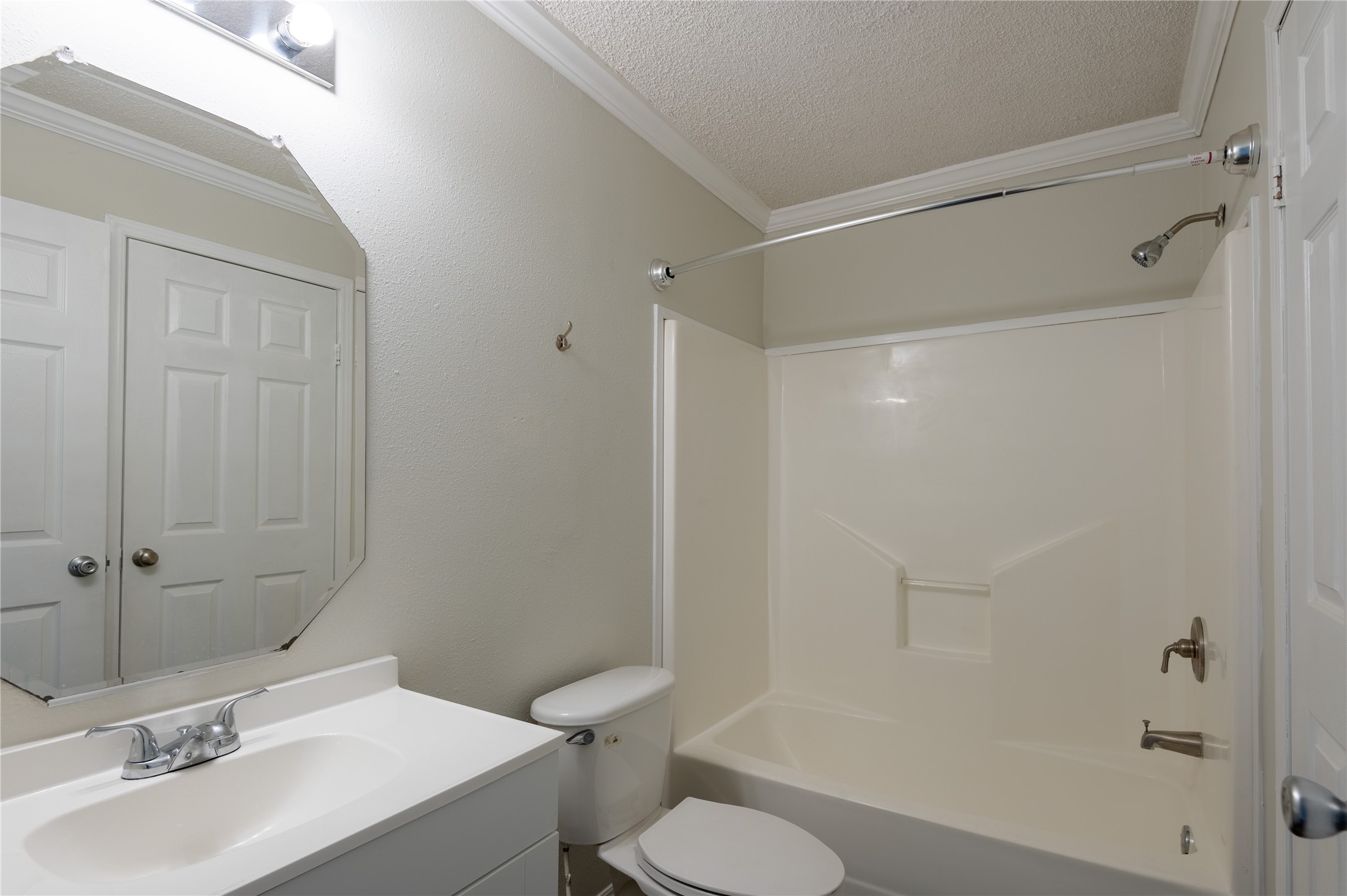 138 Varsity Circle Huntsville, TX 77340 - Photo 13 of 37 a bathroom with a sink toilet and shower