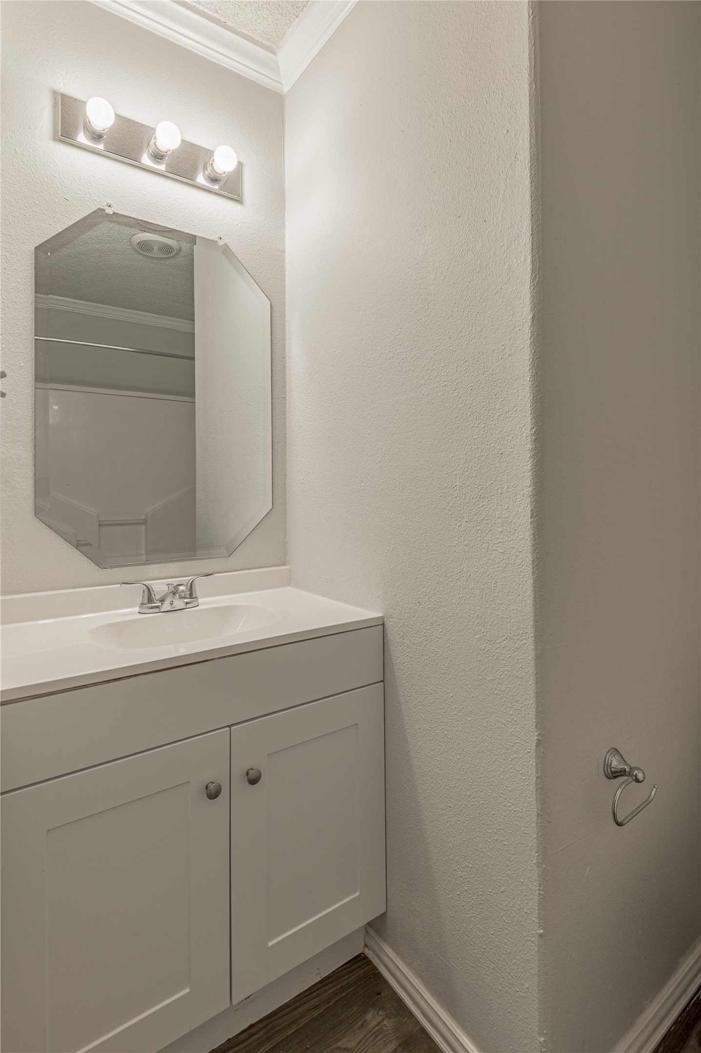 138 Varsity Circle Huntsville, TX 77340 - Photo 30 of 37 a bathroom with a sink and a mirror