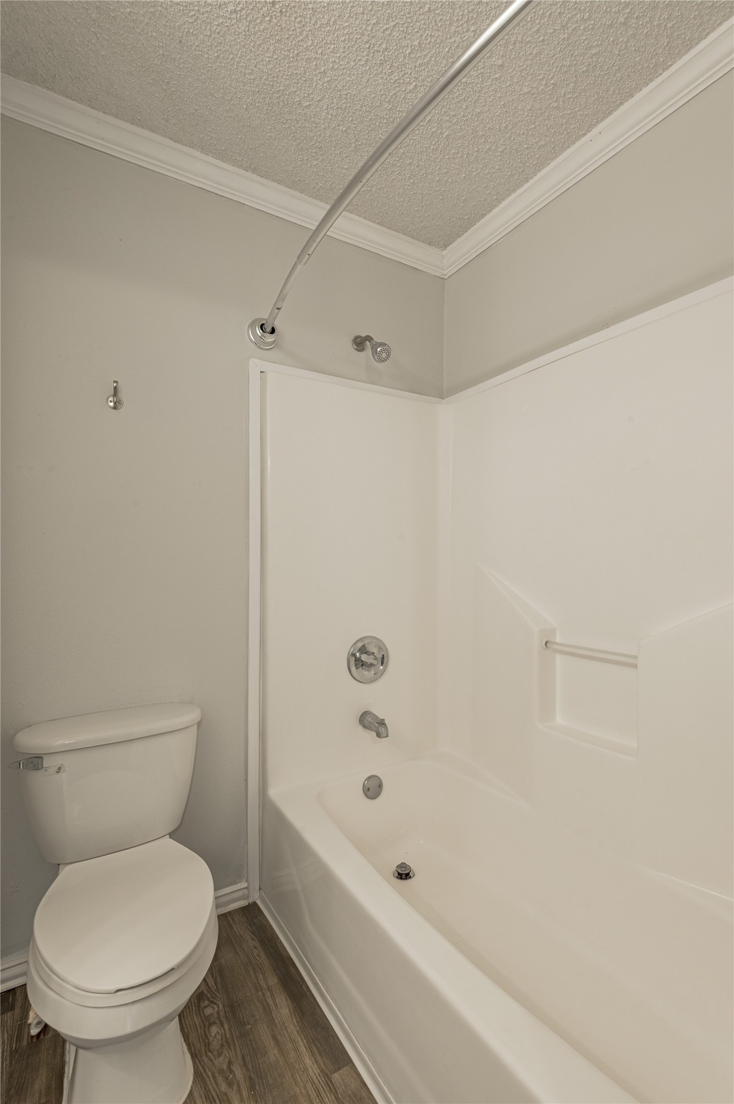 138 Varsity Circle Huntsville, TX 77340 - Photo 31 of 37 a bathroom with a toilet and a shower