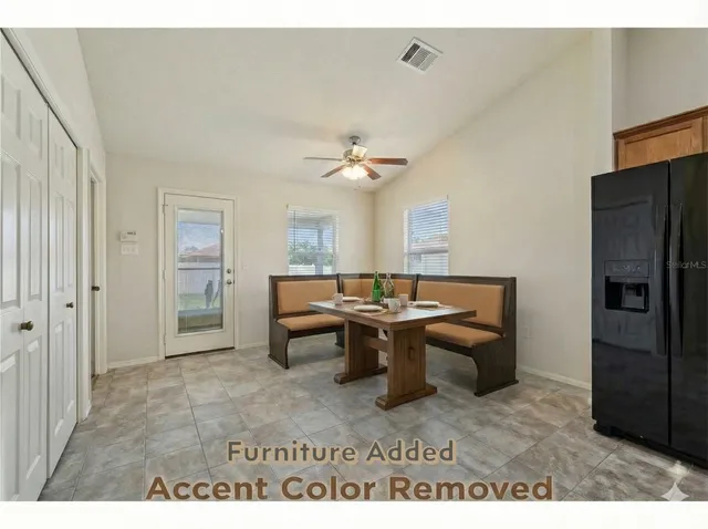 a view of a workspace with furniture