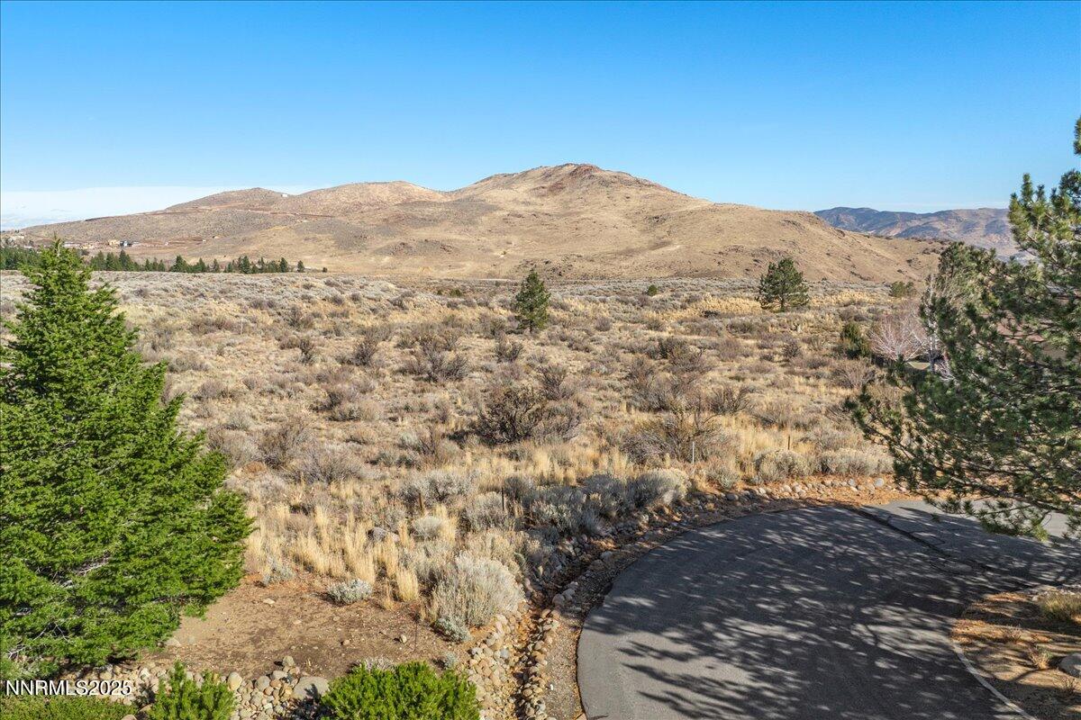 206 Paddington Court Reno, NV 89511 - Photo 9 of 21 a view of a mountain with a mountain in the background