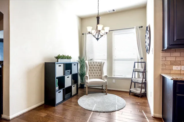 a kitchen with stainless steel appliances granite countertop a sink a counter space and cabinets
