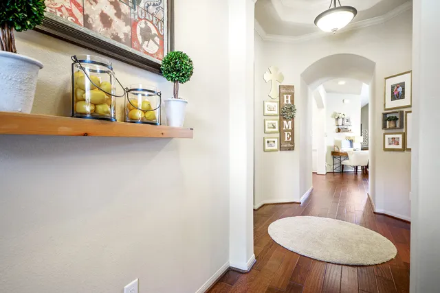 a view of a livingroom with furniture and wooden floor