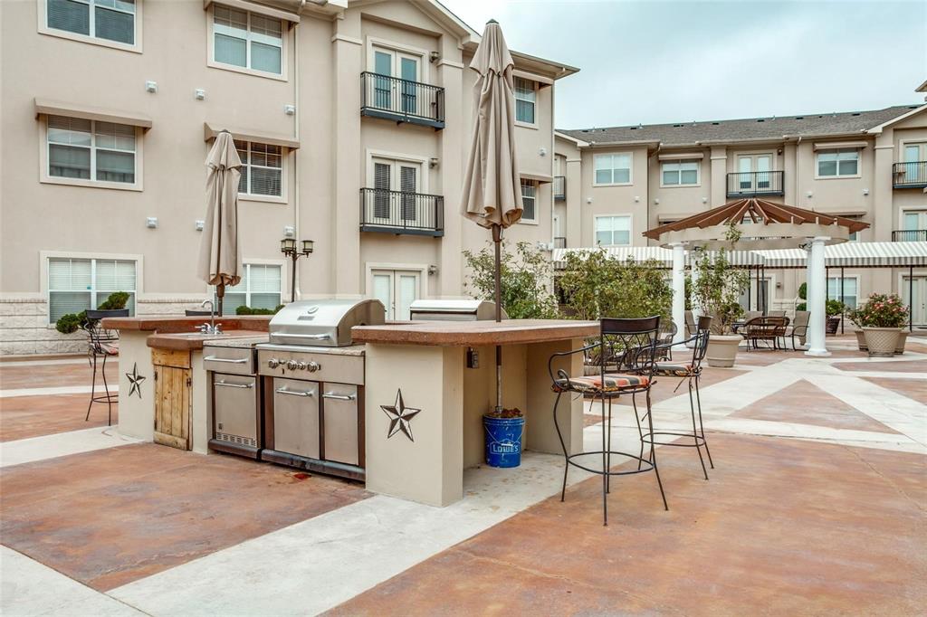 3102 Kings Road, Unit 2303 Dallas, TX 75219 - Photo 15 of 23 a view of a cafe with sitting area