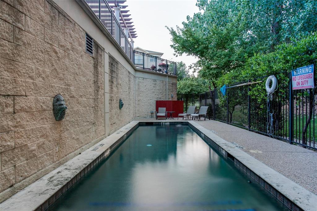 3102 Kings Road, Unit 2303 Dallas, TX 75219 - Photo 17 of 23 a view of a swimming pool with a patio