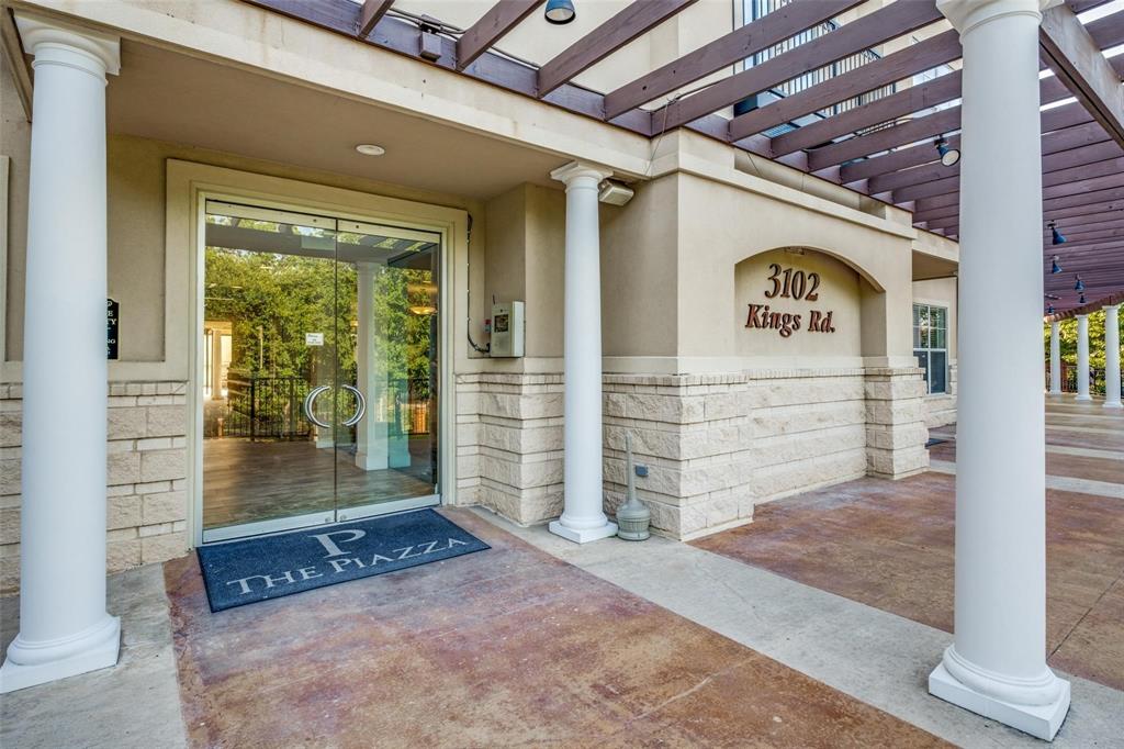 3102 Kings Road, Unit 2303 Dallas, TX 75219 - Photo 19 of 23 a view of a wooden door