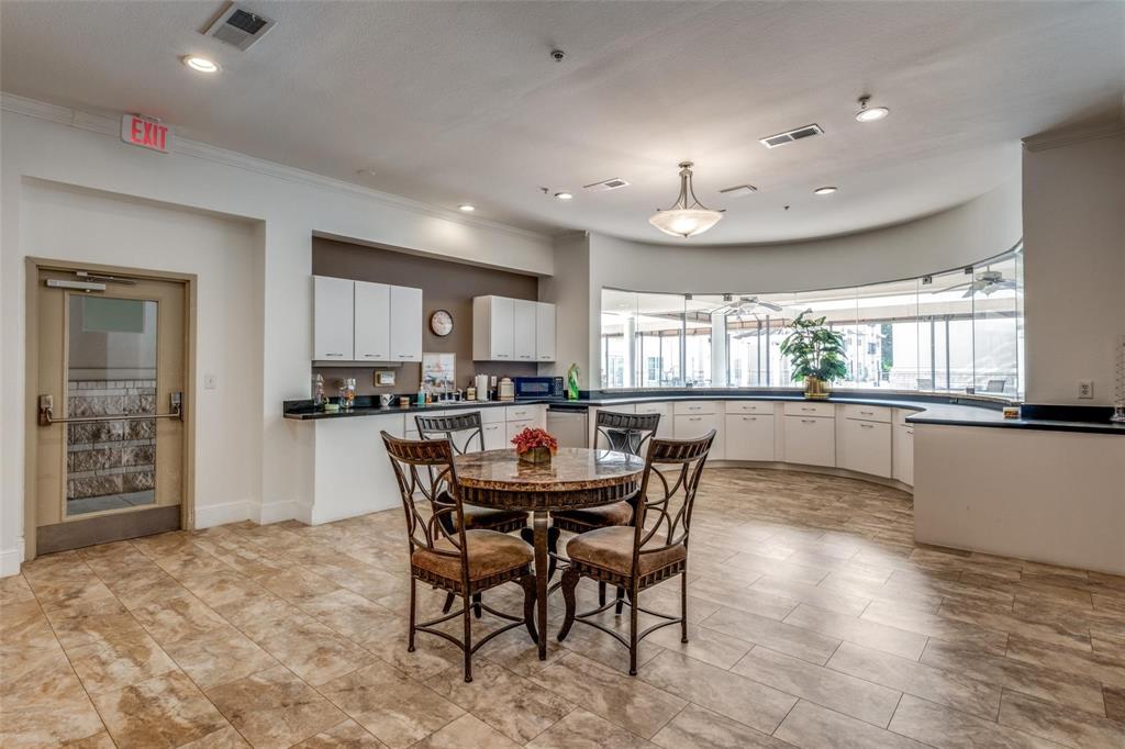 3102 Kings Road, Unit 2303 Dallas, TX 75219 - Photo 22 of 23 a view of a dining room with furniture and window
