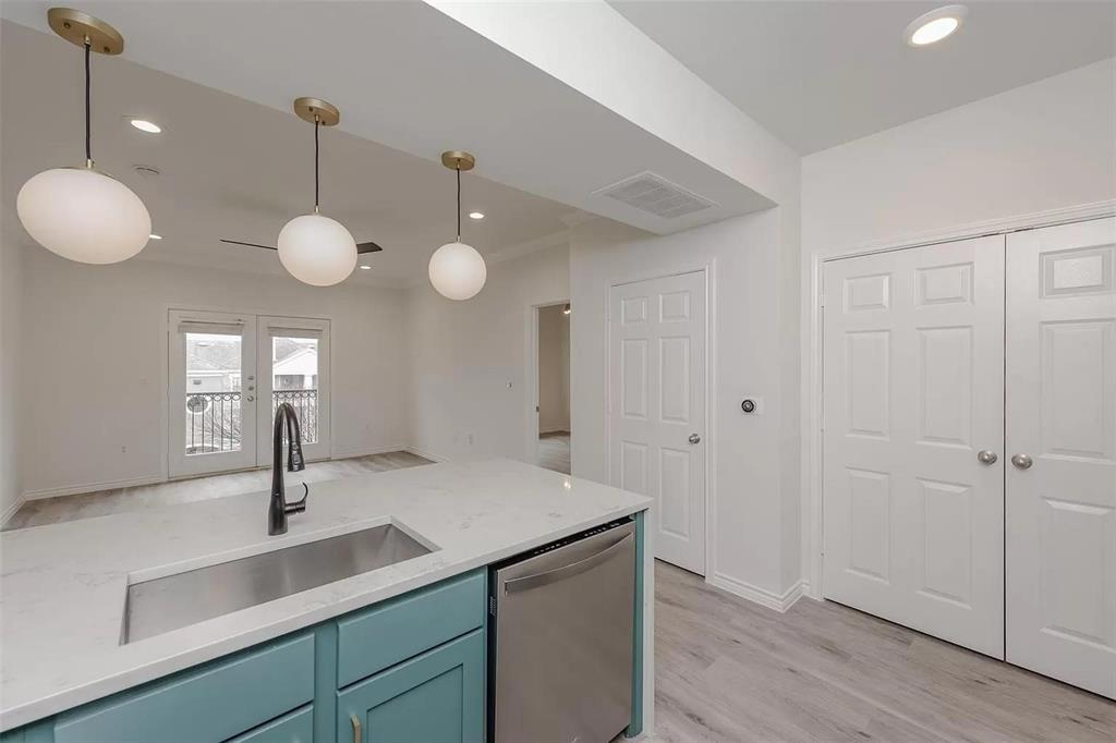 3102 Kings Road, Unit 2303 Dallas, TX 75219 - Photo 4 of 23 a kitchen with a sink and window