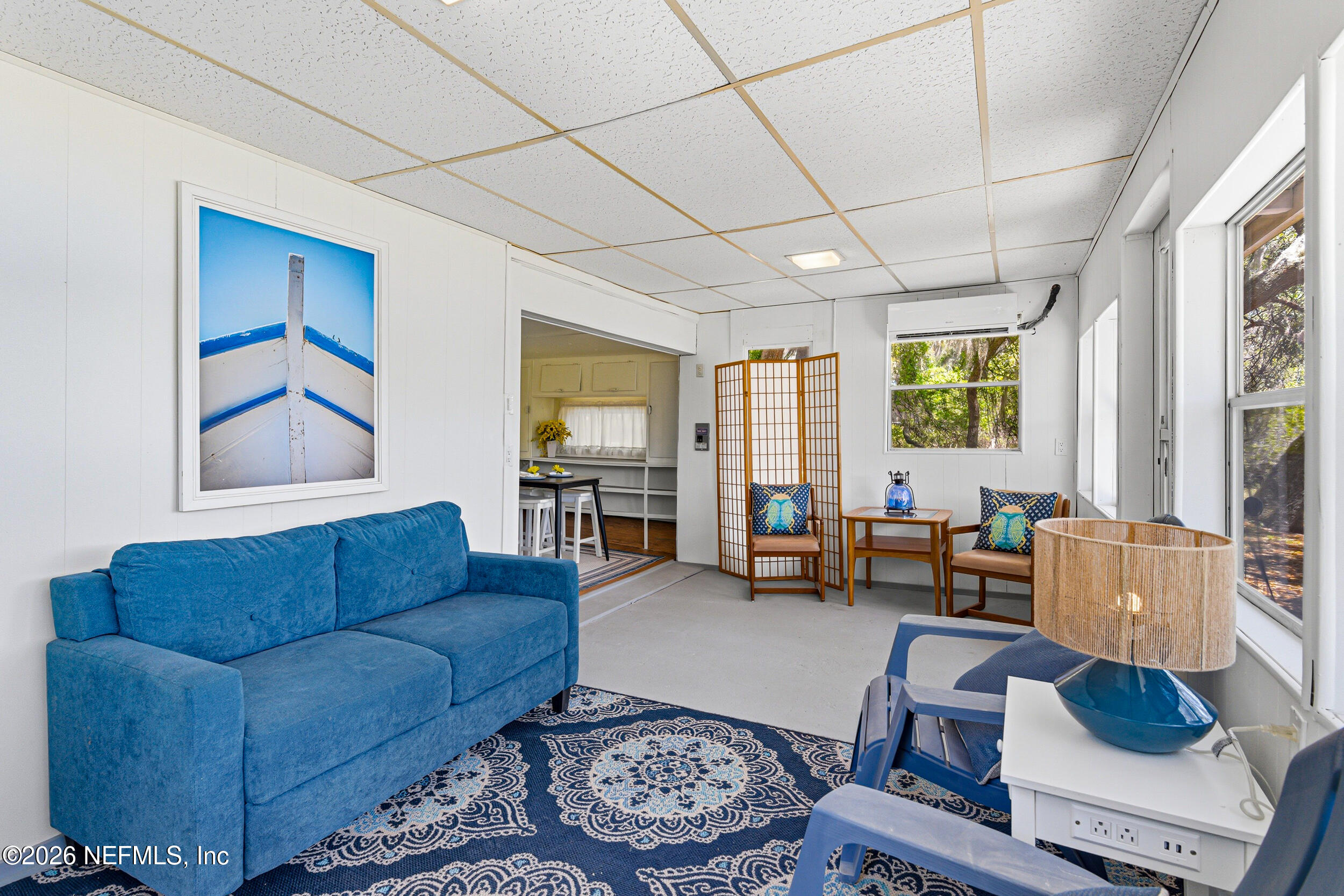 115 Lake Susan Road Hawthorne, FL 32640 - Photo 29 of 62 a living room with furniture or couch and a window