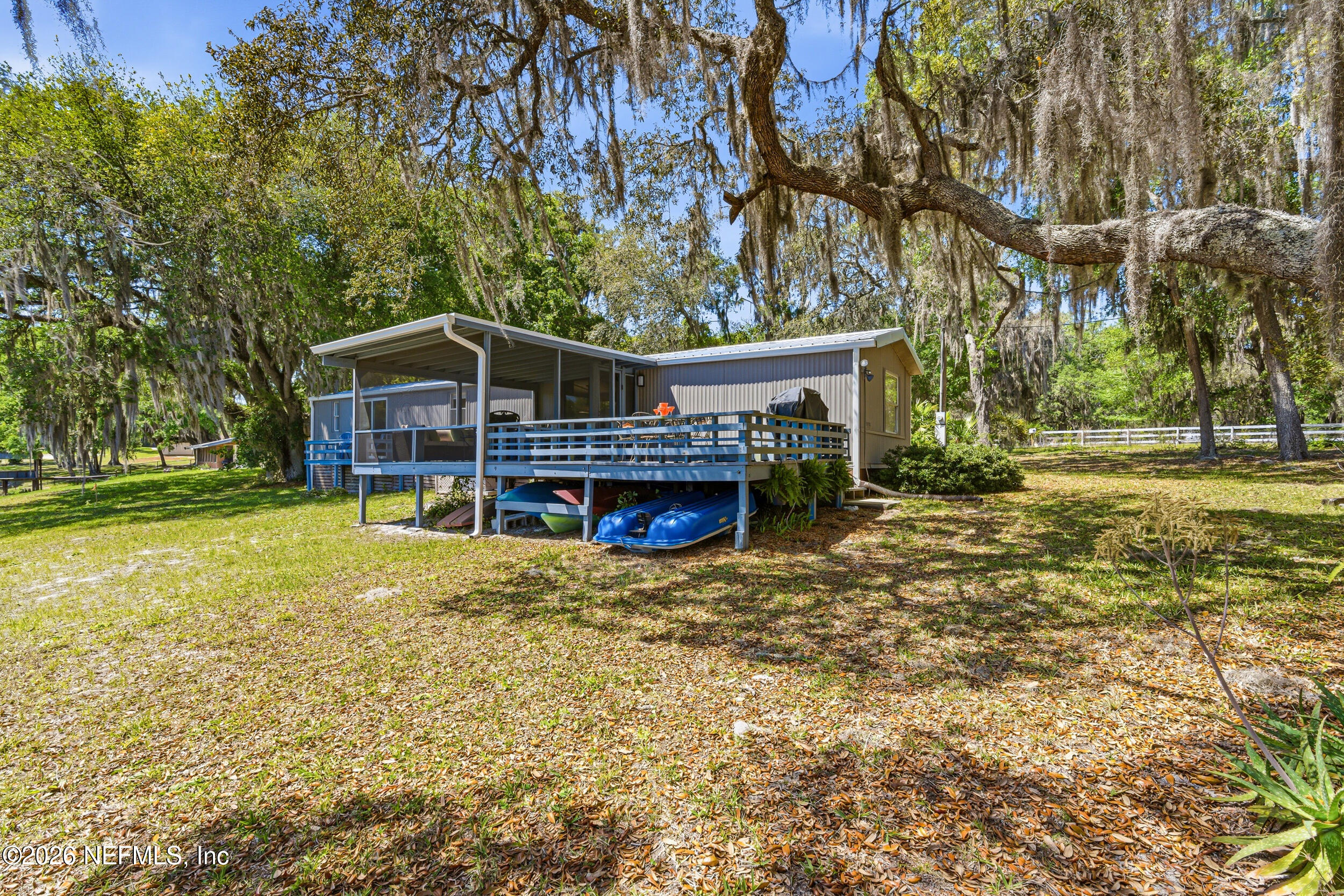 115 Lake Susan Road Hawthorne, FL 32640 - Photo 43 of 62 a view of a house with a yard and tree s